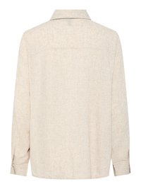 Chemise beige à manches longues avec un col classique, une couture apparente à l'arrière et des poignets boutonnés, vue de dos.