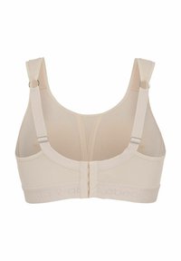 Beige sportbeha met textuur-meshpanelen, verstelbare bandjes met metalen hardware en een soepele elastieken band met logo-detail.