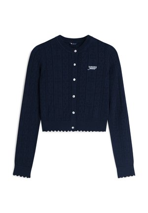 Cardigan en maille bleu marine à manches longues avec boutonnière devant, bords festonnés, motif ajouré et logo blanc "tommy jeans" sur la poitrine.