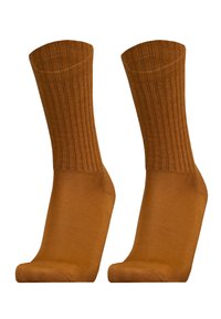 Brown ribbed crew socks with a smooth texture and reinforced toe. The upper section features a ribbed design for added stretch.