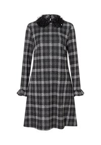 Black and gray checkered dress made of soft fabric, featuring a ruffled black collar and cuff accents, with long sleeves and a relaxed fit.