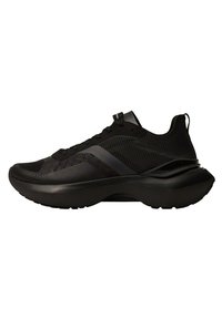 Chaussure de sport noire avec une tige en mesh, des accents texturés, une semelle arrondie et un talon rembourré. Dotée d'une fermeture à lacets et d'un profil élégant.