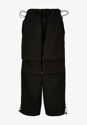 Pantaloni negri dintr-un material ușor, cu talie ajustabilă și margini cu șnur. Proiectați cu un croi lejer, supradimensionat și multiple buzunare.
