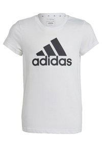 White cotton t-shirt featuring a prominent black Adidas logo. Short sleeves and a crew neck design with minimal stitching detail.