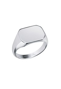 Anillo de metal tono plateado con una parte superior plana rectangular, banda redondeada y grabado "BREIL" en el lado interior. Acabado suave y pulido.