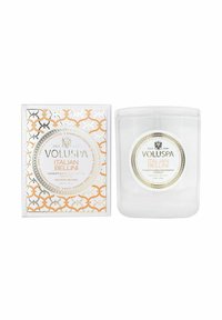 Voluspa Italian Bellini kynttilä kirkkaassa lasipurkissa, joka esittelee kultaisen ja valkoisen laatikon, jossa on pyöreitä kuvioita ja yksityiskohtaista merkintää.