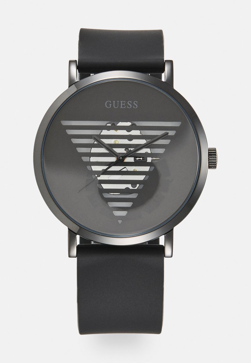Black watch with a round case, grey dial featuring horizontal stripes and a logo. Silicone strap, metallic accents, and a minimalist design.