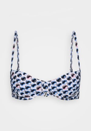 Bikini topp med justerbare stropper, med en hvit bunn dekorert med runde fargerike prikker i nyanser av blått, svart og rosa.