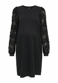 Robe noire longueur genoux avec un col rond, manches longues texturées ornées de sequins floraux et poignets côtelés aux ourlets des manches.