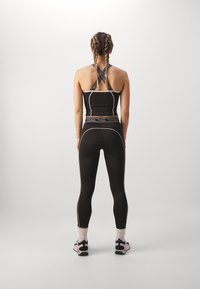 Puma FIT TRAIN STRONG 7/8 - Leggings - black