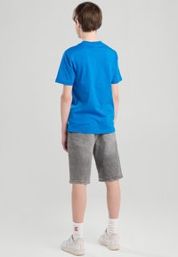 America Today NATE - Farkkushortsit - light grey