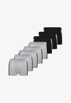 Fünf graue und drei schwarze Boxer-Shorts mit seitlichen Streifen, angeordnet in zwei diagonalen Reihen vor weißem Hintergrund.