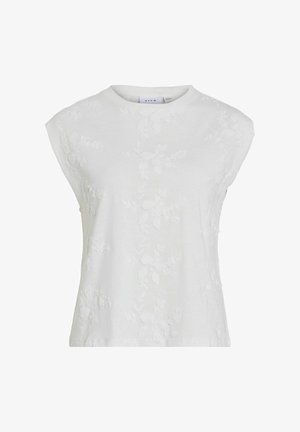 Top scurt alb cu mânecă scurtă și decolteu rotund, decorat cu motive de broderie florală și o croială lejeră. Material moale din bumbac.