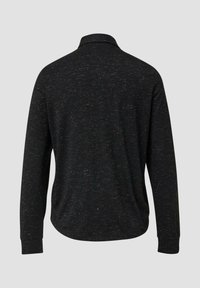 Zwarte polo met lange mouwen van een textuurstof, met een kraag en een ronde zoom. Fijn gemêleerd patroon door het geheel.