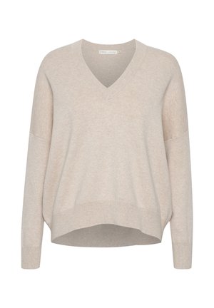 Pull en v beige avec épaules tombantes, manches longues et coupe décontractée. Tissu doux et texturé avec un ourlet légèrement cropped.