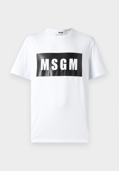 White cotton T-shirt featuring a large black rectangular print with "MSGM" in bold white letters. Short sleeves and round neckline.