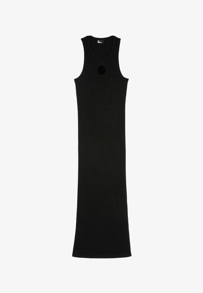 Robe débardeur noire à côtes avec une silhouette ajustée, présentant un col rond et un accent florale au niveau de la poitrine. Fabriquée dans un tissu extensible.