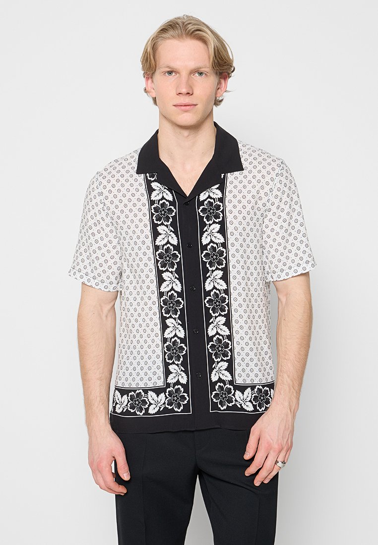 Camisa