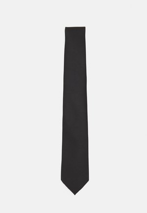 Un nœud papillon noir en tissu lisse, doté d'une forme slim et allongée avec une pointe et sans motifs ni accents visibles.