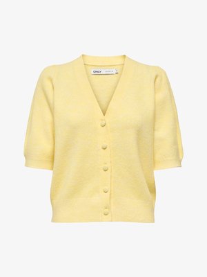 Puha sárga, rövid ujjú kardigán V-nyakkivágással, öt szövetborítású gombbal az elején, bordázott szegéllyel és mandzsettával.