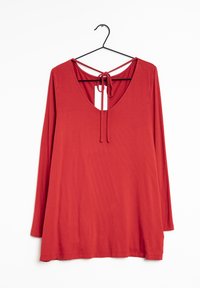 Next Pusero - red