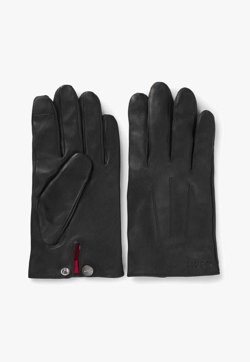 Gants en cuir noir avec une finition lisse, dotés d'une doublure rouge, de quatre détails de surpiqures verticales au dos et d'une fermeture à bouton-pression.