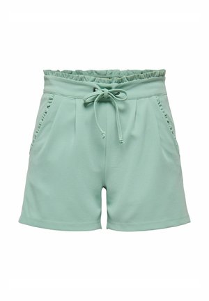 Miętowe szorty wykonane z miękkiego materiału, z elastycznym paskiem w talii zdobionym falbanką, sznurkiem do zawiązywania oraz bocznymi kieszeniami.