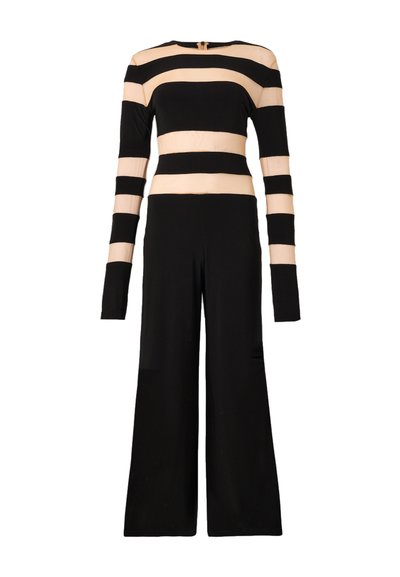 Black and nude long-sleeve jumpsuit featuring horizontal stripes, fitted upper, flared legs, and a keyhole back closure.