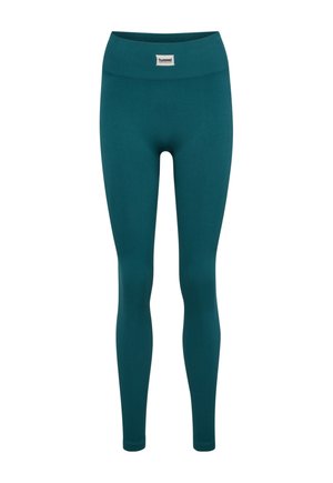 Seledynowe prążkowane, bezszwowe legginsy z wysokim paskiem i małą białą naszywką z logo hummel na środku przedniego paska.