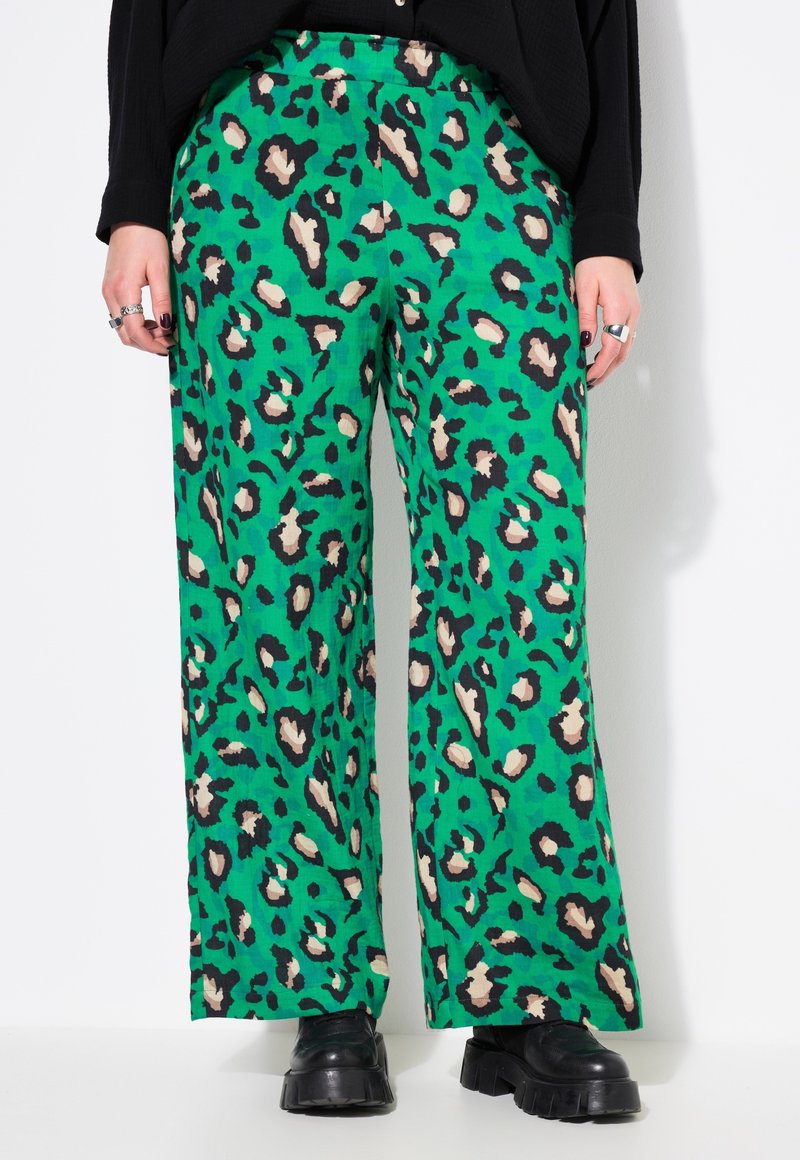 Groene wijde broeken met een luipaardprint in zwart en beige. Gemaakt van een textuurstof, met een relaxte pasvorm en een elastische tailleband.