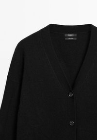 Black cashmere cardigan with a deep V-neck, featuring long sleeves and three front buttons. The fabric has a soft, smooth texture.