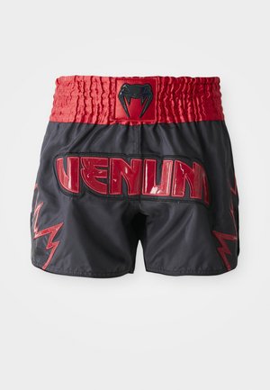 Black shorts with a red elastic waistband; features "VENUM" logo and red lightning bolt accents, made of lightweight, smooth material.