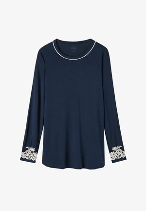 Haut à manches longues bleu marine avec un col rond et des finitions blanches. Présente des accents en dentelle crème aux poignets. Tissu doux et léger.