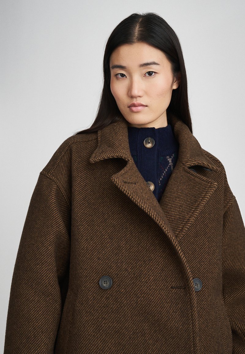 Manteau mi-saison 'Logan' WEEKDAY en Noir | ABOUT YOU