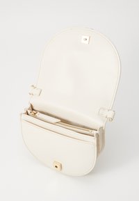 Tommy Hilfiger HERITAGE SADDLE - Cross body bag - beige