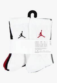 Lot de six chaussettes basses en blanc, noir et rouge. Caractéristiques : texture côtelée, conception rembourrée et logos Jordan brodés sur les côtés.