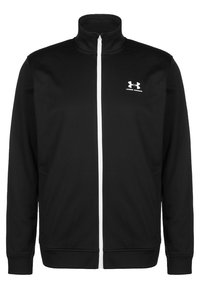 Zwarte zip-up jack gemaakt van een gladde stof, met een opstaande kraag, witte rits en een klein wit logo op de linkerborst.