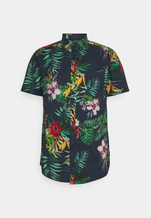 Marineblauw overhemd met korte mouwen, knopen aan de voorkant en tropische bloemenprint met groene bladeren en rode, gele en roze bloemen.