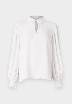 Biela blúzka s golierom a detailom v tvare kľúčovej diery. Dlhé, plisované rukávy s elastickými manžetami. Hladká textúra a voľný strih.
