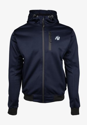 Marineblauwe hoodie-jack met een gladde textuur, ritssluiting aan de voorkant en elastische manchetten. Bevat een logo op de borst en een verstelbare trekkoordkap.