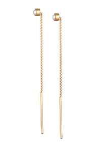 Guld dråbeøreringe med forlængede kæder, der har en glat overflade og en lille dekorativ krystal øverst.