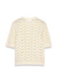 Top beige de punto de manga corta con un patrón calado con bordes ondulados y ribete acanalado, mostrado desde atrás sobre un fondo blanco.