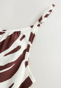 Unselected, brown white zebra