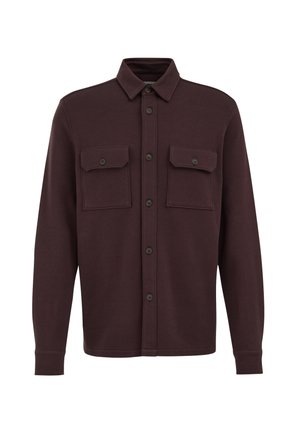 Tmavě hnědá košile s dlouhým rukávem, límcem, zapínáním na knoflíky vpředu a dvěma kapsami na hrudi s klopami na knoflíky.