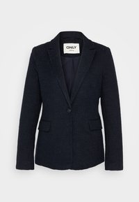 Námořnický strukturovaný blejzr s jedním knoflíkem, klopovými límci a dvěma předními kapsami. Přiléhavý střih, vyrobený z tkané látky.