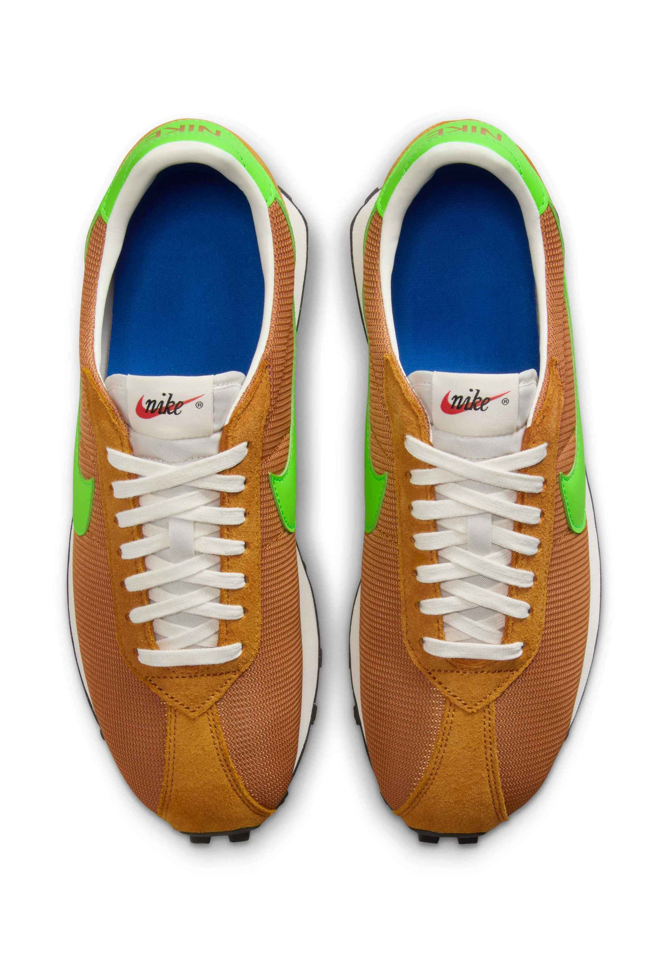 green nikes with orange laces