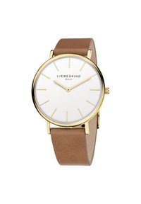 Orologio analogico rotondo con quadrante bianco, lancette e indici in tonalità oro, e cinturino in pelle beige. Presenta un design minimalista e una texture liscia.