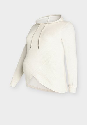 Ljusbeige graviditetshoodie med korslagd design, långa ärmar, justerbar dragsko och mjukt texturerat tyg.