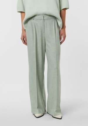 - Spodnie materiałowe