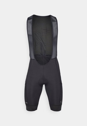 Sorte cykelbibs med en struktureret mesh-overdel og polstret sæde. Har en tætsiddende pasform, flade sømme og logo på den nederste del af benet.